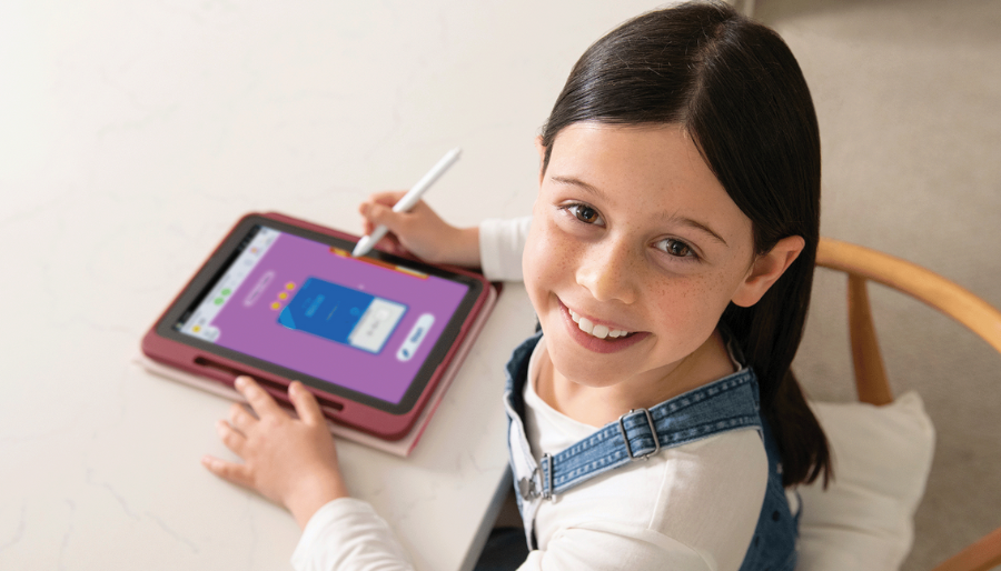 Child using reading app on tablet